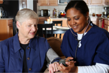 Caregiver checking elder